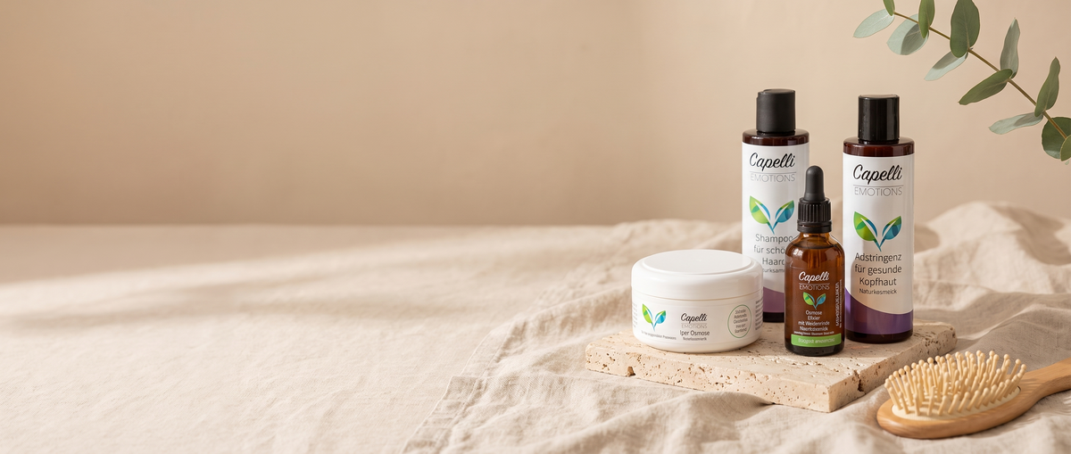 Capelli Emotions Sortiment auf Leinen und Travertin mit Eukalyptus und Naturborsten-Bürste
