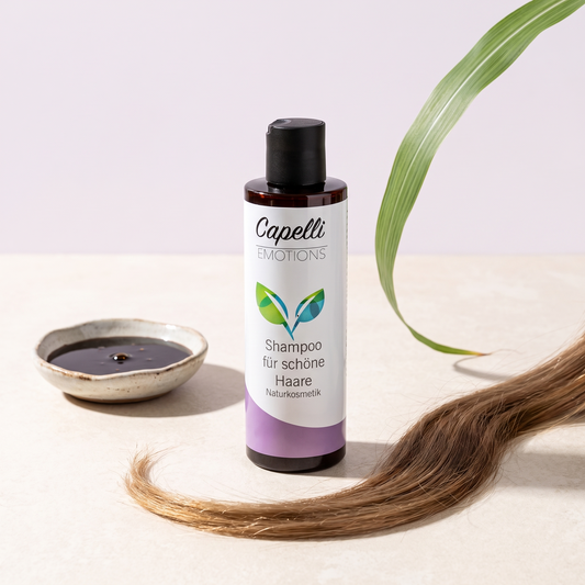 Capelli Emotions Shampoo für schöne Haare auf Naturstein mit Haarsträhne und Zuckerrohr