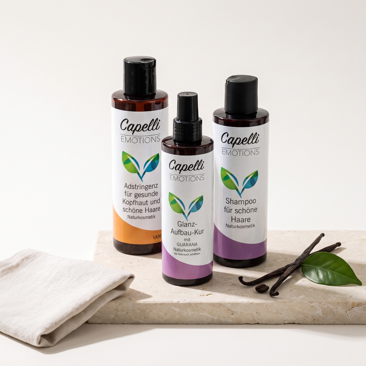 Starterset Schöne Haare: Shampoo für schöne Haare, Adstringenz Vanille und Glanz-Aufbau-Kur auf hellem Naturstein